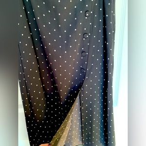 Jupe noire à pois blancs